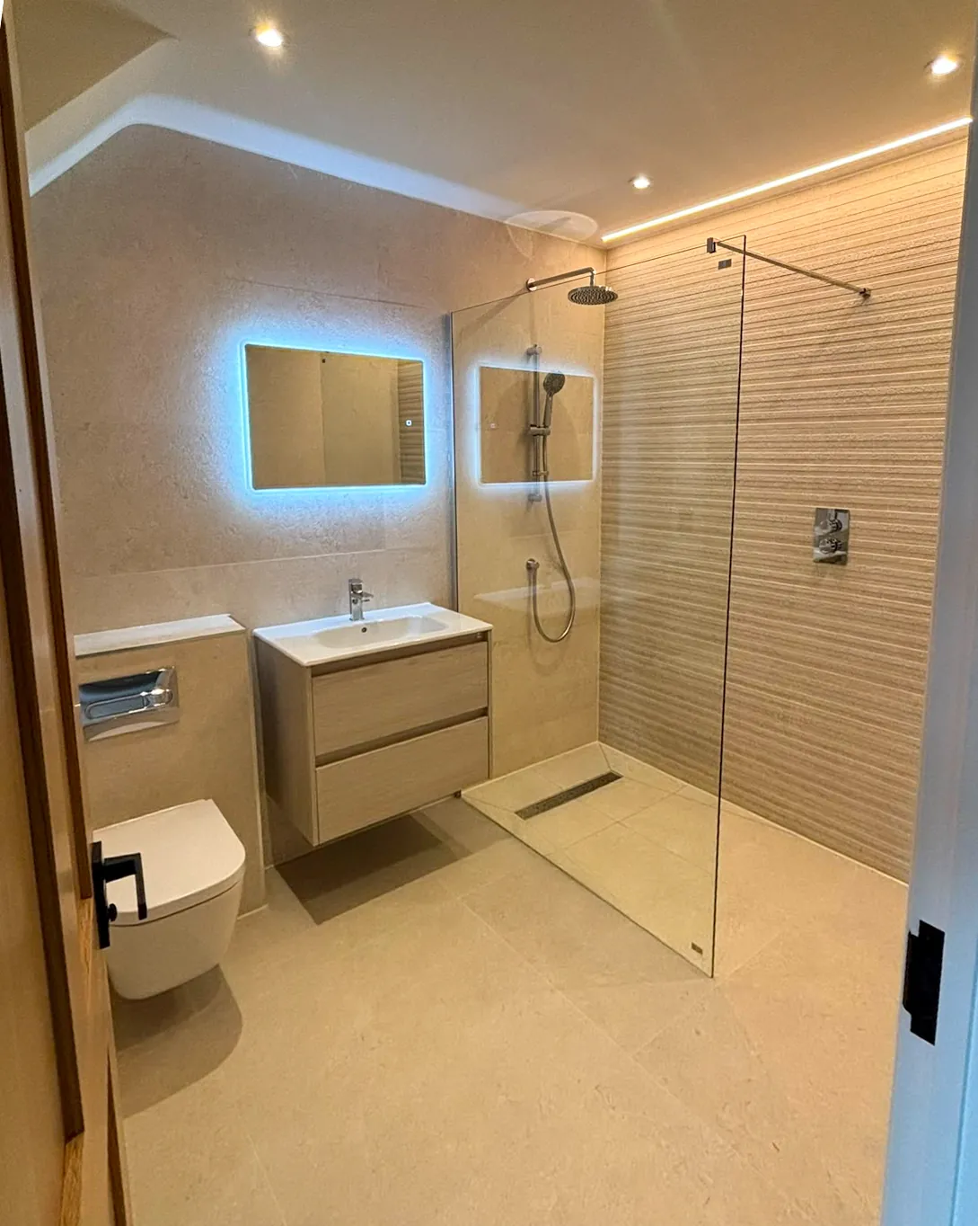 Beige stone wet room