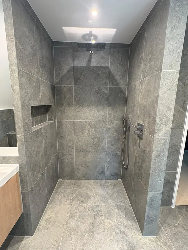 Finished walk-in shower with niche