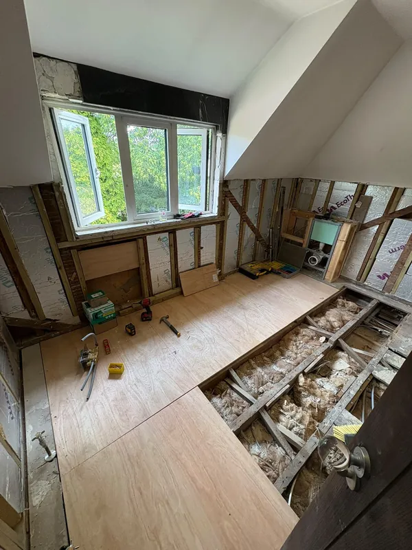 Floor joists exposed during the strip-out